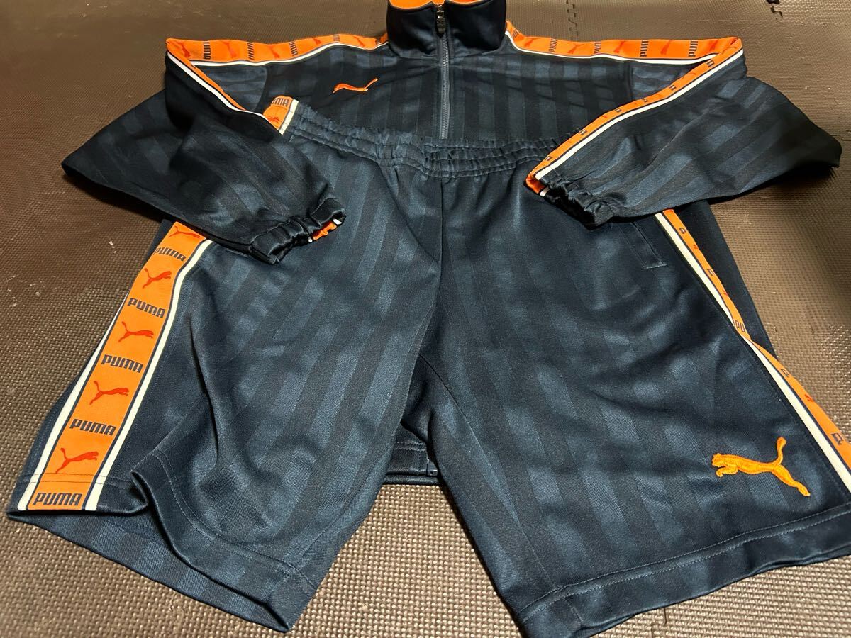 美品PUMA濃紺ストライプ、ロゴオレンジ(刺繍)肩ラインロゴ入り上下セット サイズSS〜S拍卖