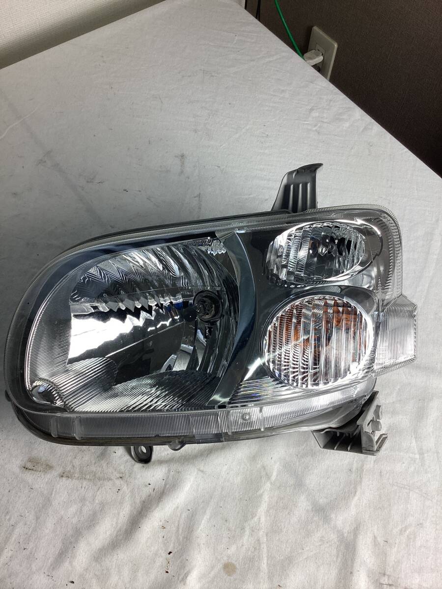 ダイハツ タント 左側ヘッドライト拍卖