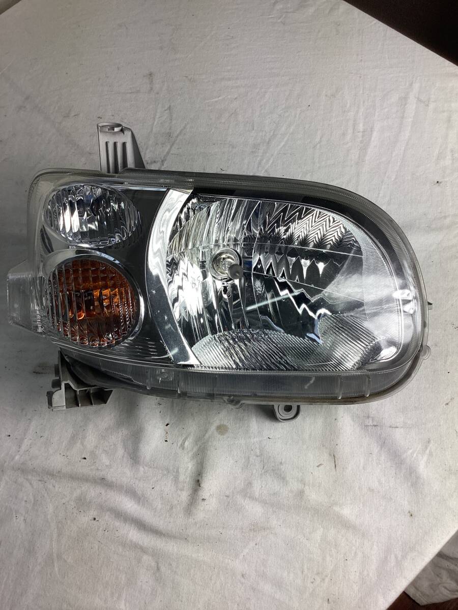 ダイハツ タント 右側ヘッドライト拍卖