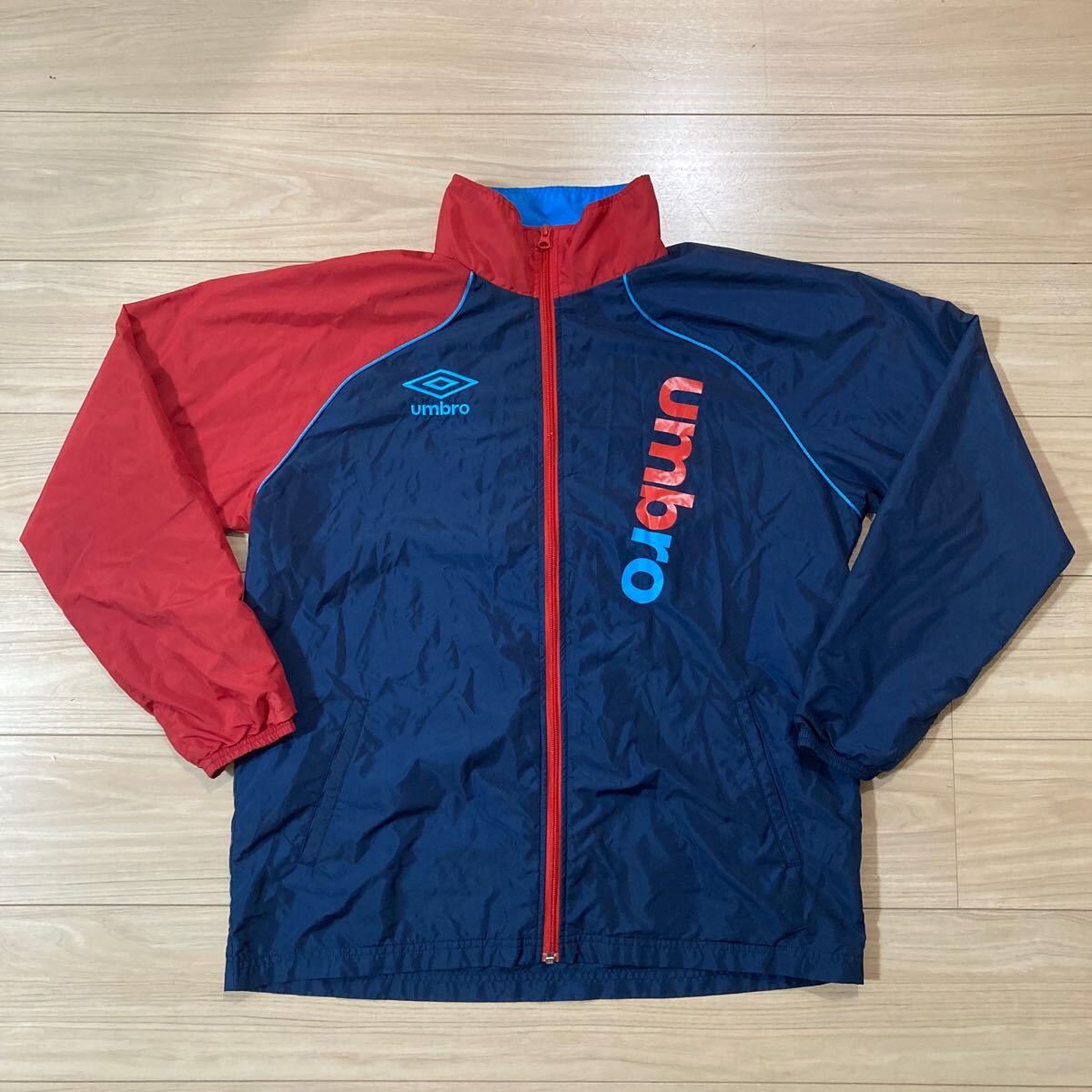 umbro アンブロ ナイロンジャージ ウィンドブレーカー ジップアップ Lサイズ ネイビー 赤 サッカー フットサル拍卖