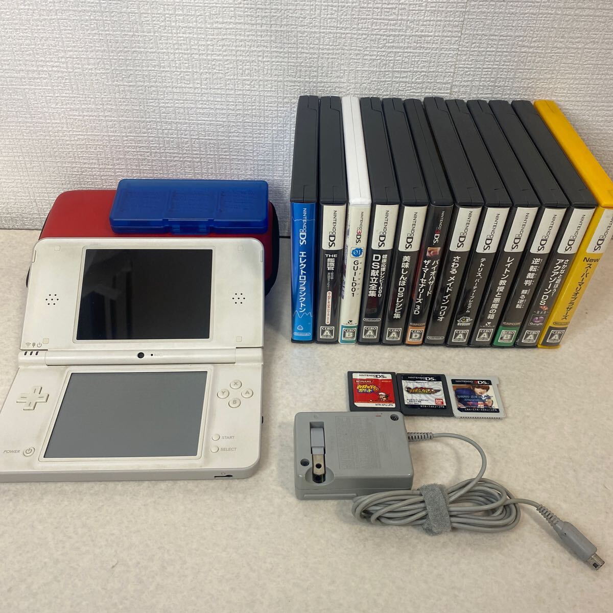 R0527 Nintendo 任天堂 DSLL UTL-001 通電確認済み ソフト15本付 本体 モニター画面焼け 拍卖