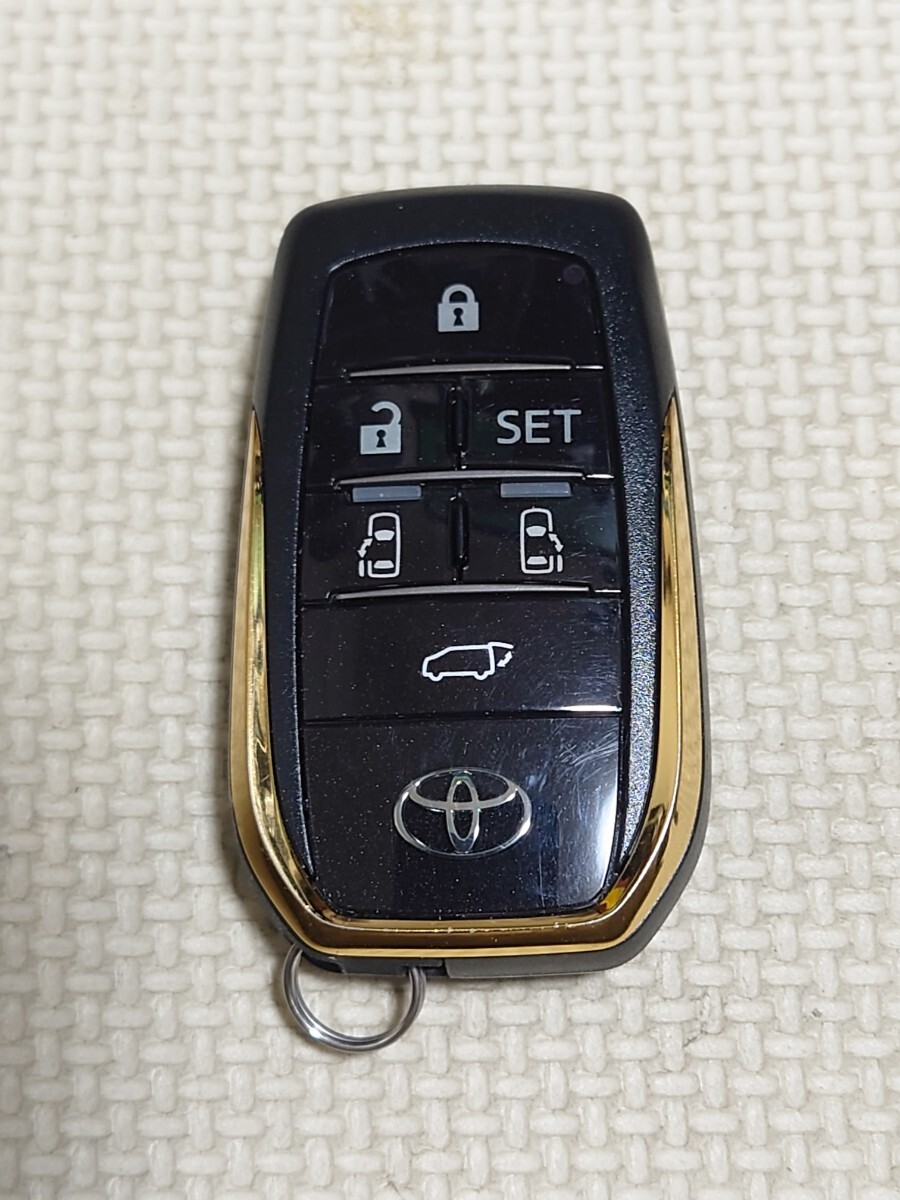 トヨタ純正 6ボタン スマートキー パワーバックドア ベルファイア等 中古品 拍卖