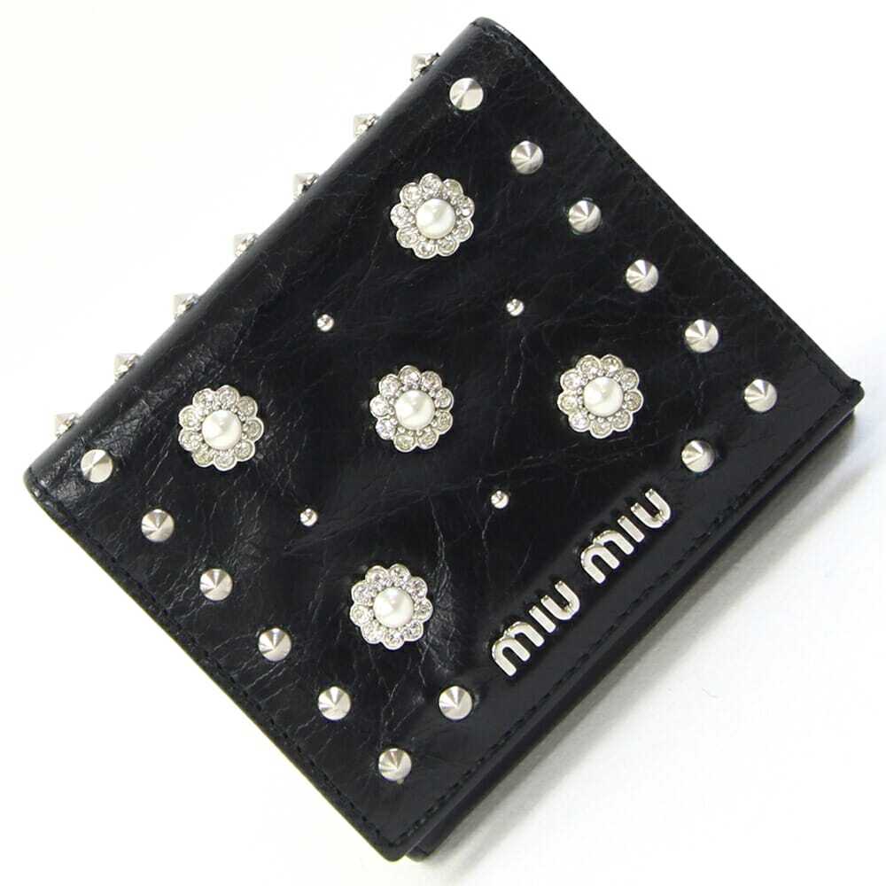 ミュウミュウ 二つ折り財布 5M1321 ブラック レザー 中古 コンパクトウォレット ミニ財布 スタッズ フラワー レディース拍卖