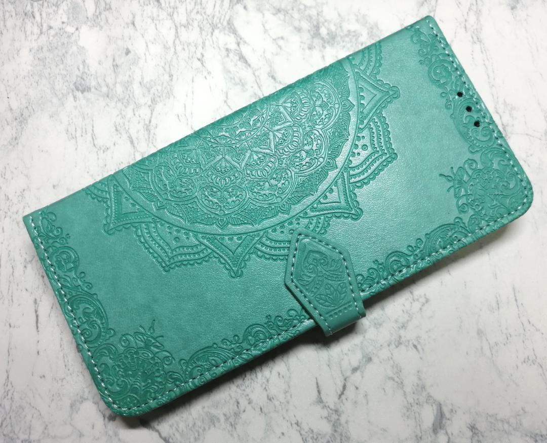 送料込み 手帳型 iPhone14Plus 用 ケース 浮彫曼荼羅 グリーン 緑色拍卖