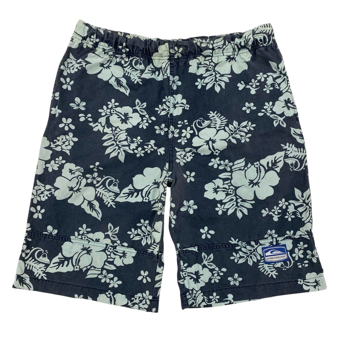 オーストラリア製QUIKSILVER(クイックシルバー)ハーフパンツ ハイビスカス柄 メンズS ネイビー系拍卖