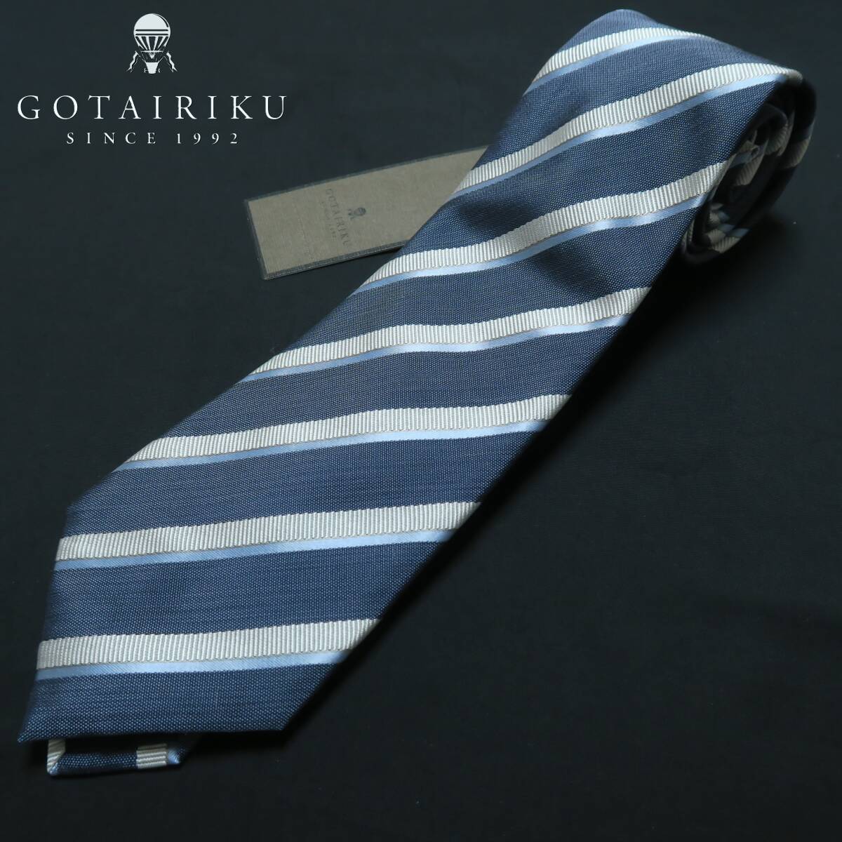 W139■オンワード樫山 五大陸 ゴタイリク 未使用品 ハンドメイド 日本製 紺色系 レジメンタル 絹100% 上質 高級ネクタイ 14300円拍卖