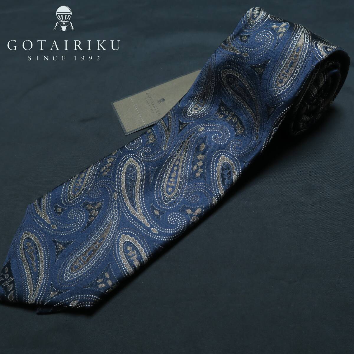 W191■オンワード樫山 五大陸 ゴタイリク 未使用品 ハンドメイド 日本製 紺色系 ペイズリー柄 絹100% 上質 高級ネクタイ 14300円拍卖