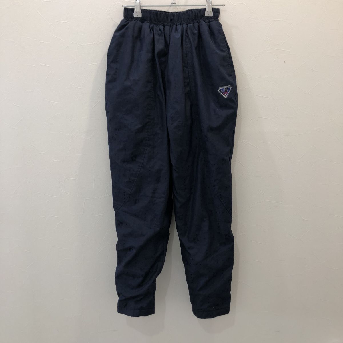 TNZ1463 ウィメンズ エレッセ ウインドパンツ 透かし柄 ネイビー レディース M拍卖