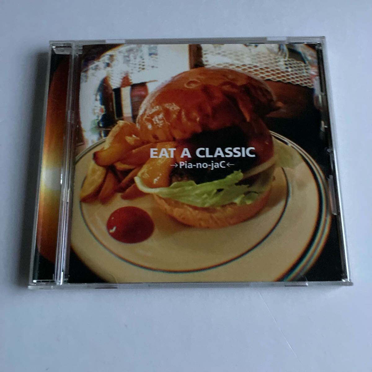 CD 音楽ユニット「→Pia-no-jaC←」のクラシックカバーアルバム「EAT A CLASSIC」盤面きれいです(管0753)拍卖