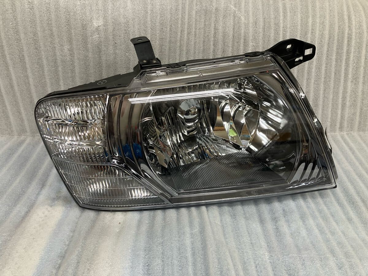 中古 三菱 パジェロ V73W 右HIDヘッドライト 8301A112拍卖