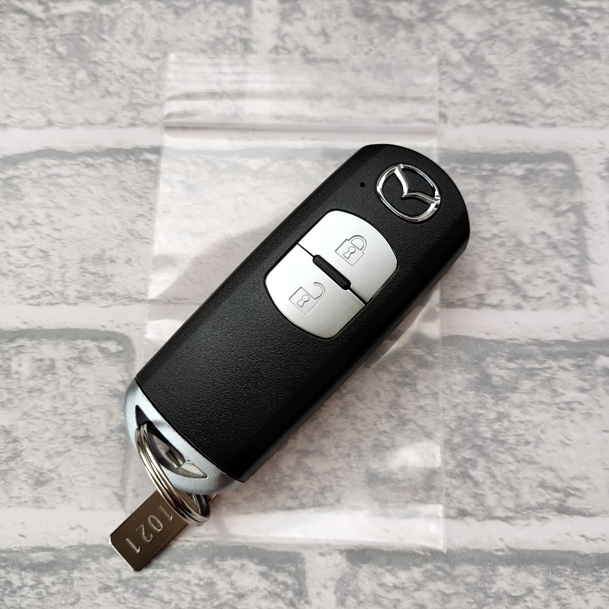 ☆未使用保管/送料無料/マツダ/2ボタン/SKE13D-01/007-AD0635/デミオ/アクセラ/アテンザ/CX-3/CX-5他/キーレス/スマートキー☆B2505-9-3拍卖