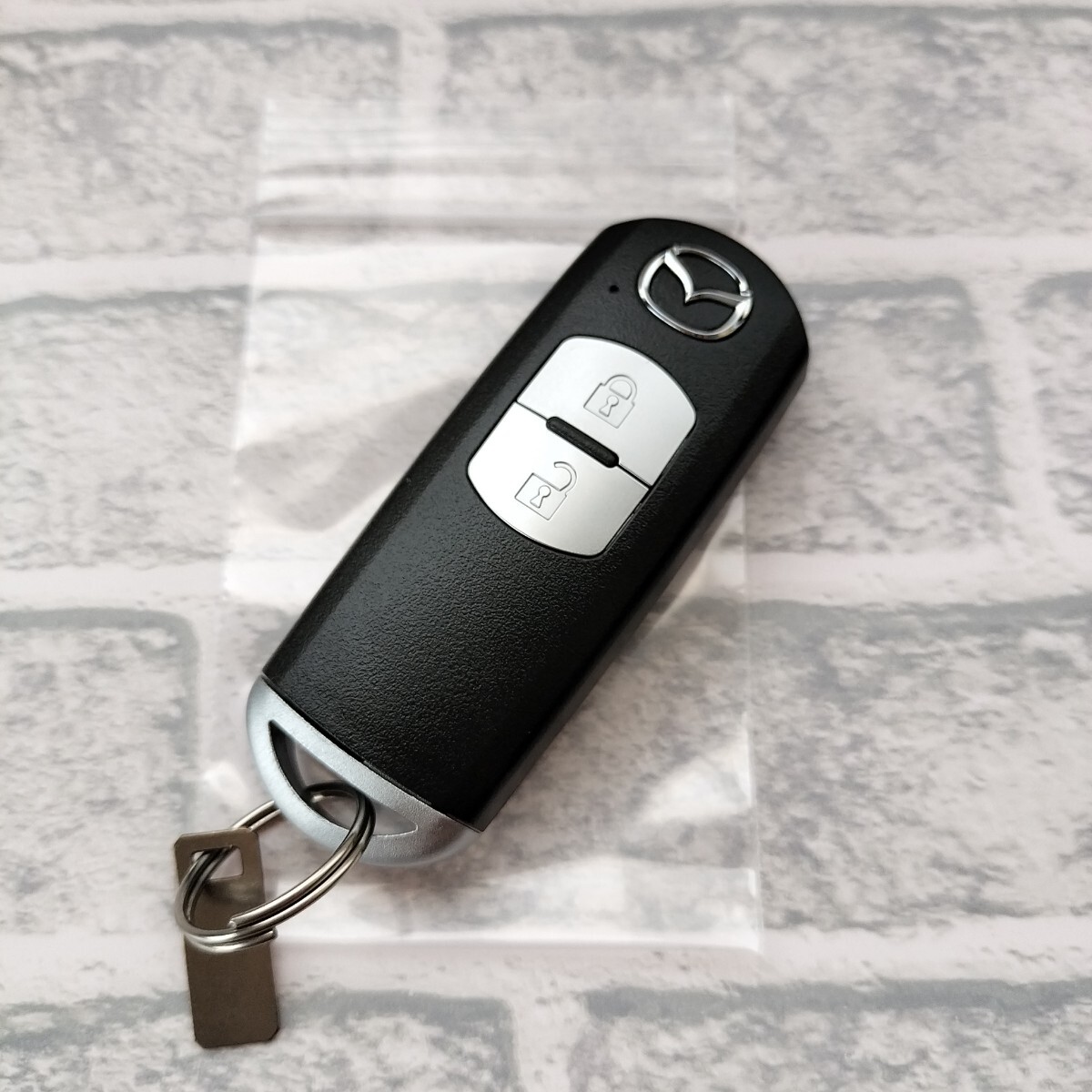 ☆未使用保管/送料無料/マツダ/2ボタン/SKE13D-01/007-AD0635/デミオ/アクセラ/アテンザ/CX-3/CX-5他/キーレス/スマートキー☆B2505-9-4拍卖