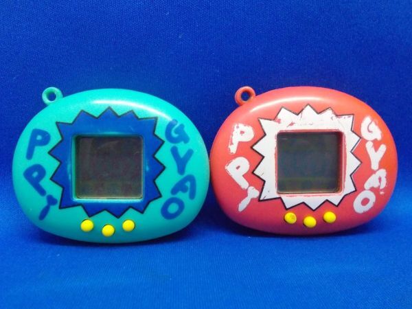 ぎゃおッpi グリーン&ピンク 2個セット 電子ペット 育成ゲーム たまごっち 駄菓子屋 チープトイ ぎゃおっぴ 現状品拍卖