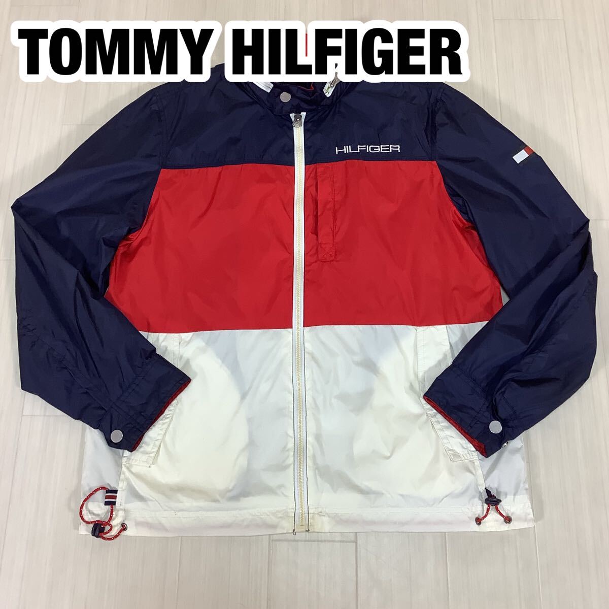 TOMMY HILFIGER トミーヒルフィガー セーリングジャケット ナイロンジャケット M トリコカラー 切り替えし 収納式フード 刺繍ロゴ 裏地付拍卖