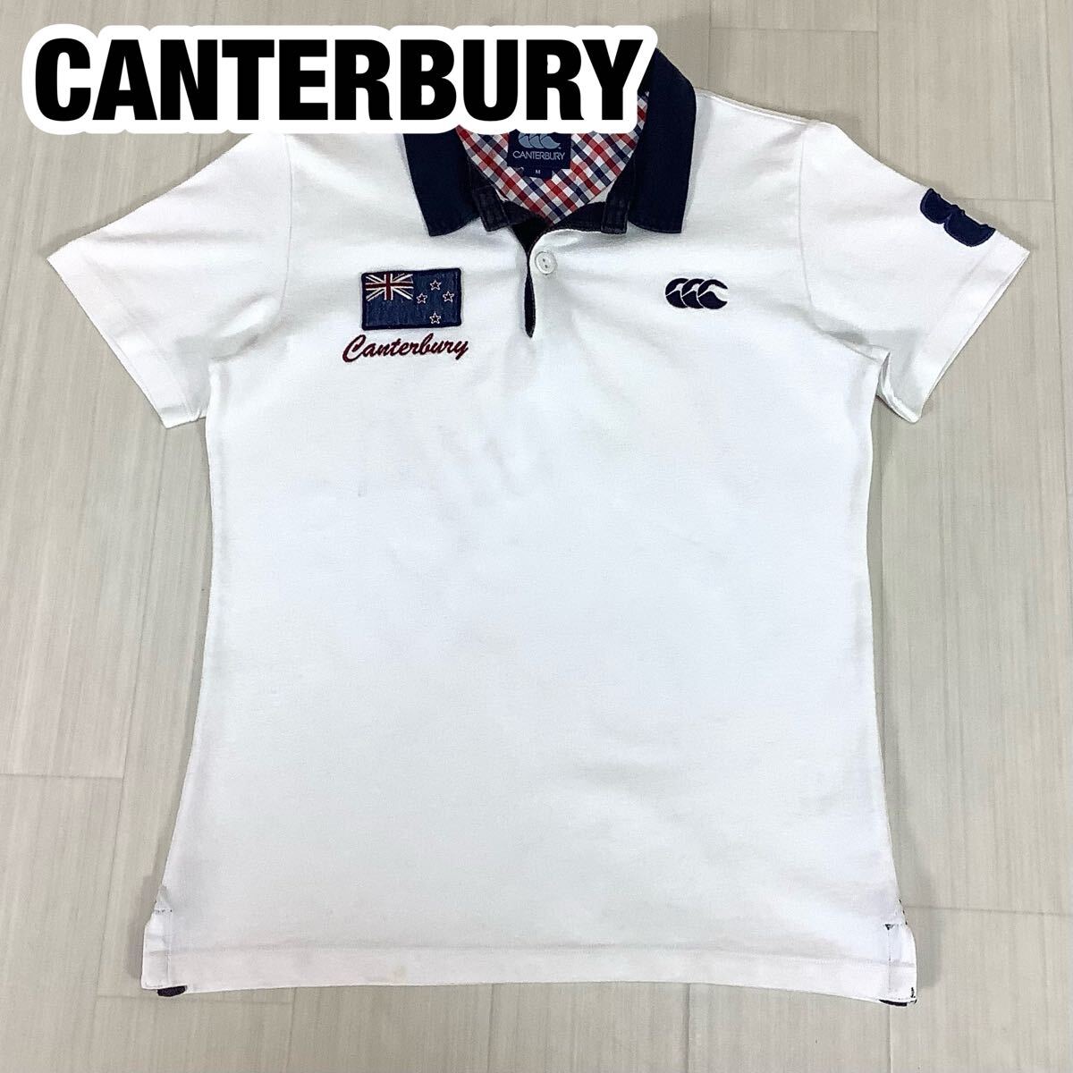 CANTERBURY カンタベリー 半袖ラガーシャツ ポロシャツ レディースM ホワイト 白 刺繍ロゴ 袖ゼッケン ゴムボタン拍卖