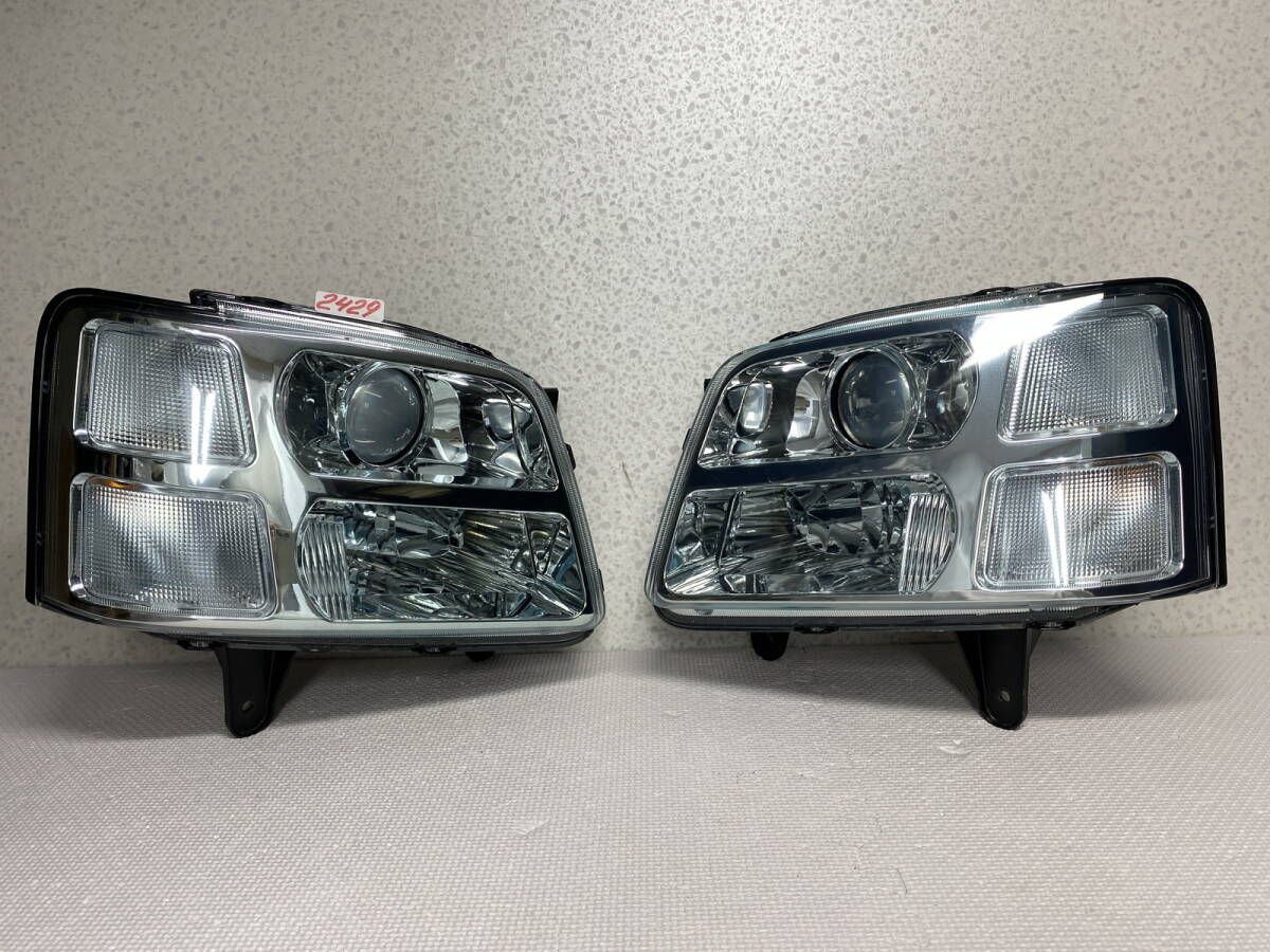 2429 * 青みがかった * シボレー MW ME34S ヘッドライト 左右 セット ハロゲン レベ付 スタンレー P1368 左 右拍卖