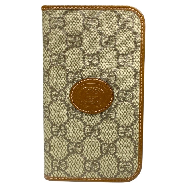 【新品】GUCCI グッチ 760184 アイフォンケース iPhone15 スマホケース 手帳型 GGスプリーム 小物 PVC レザー ブラウン拍卖