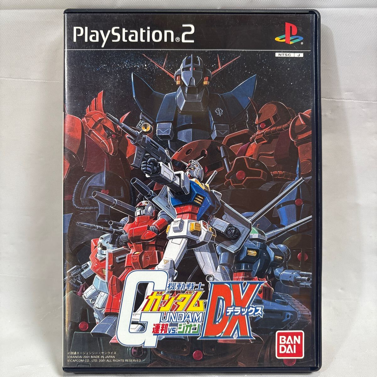 PS2/ 機動戦士ガンダム 連邦VSジオン DX 取説有り 中古品拍卖