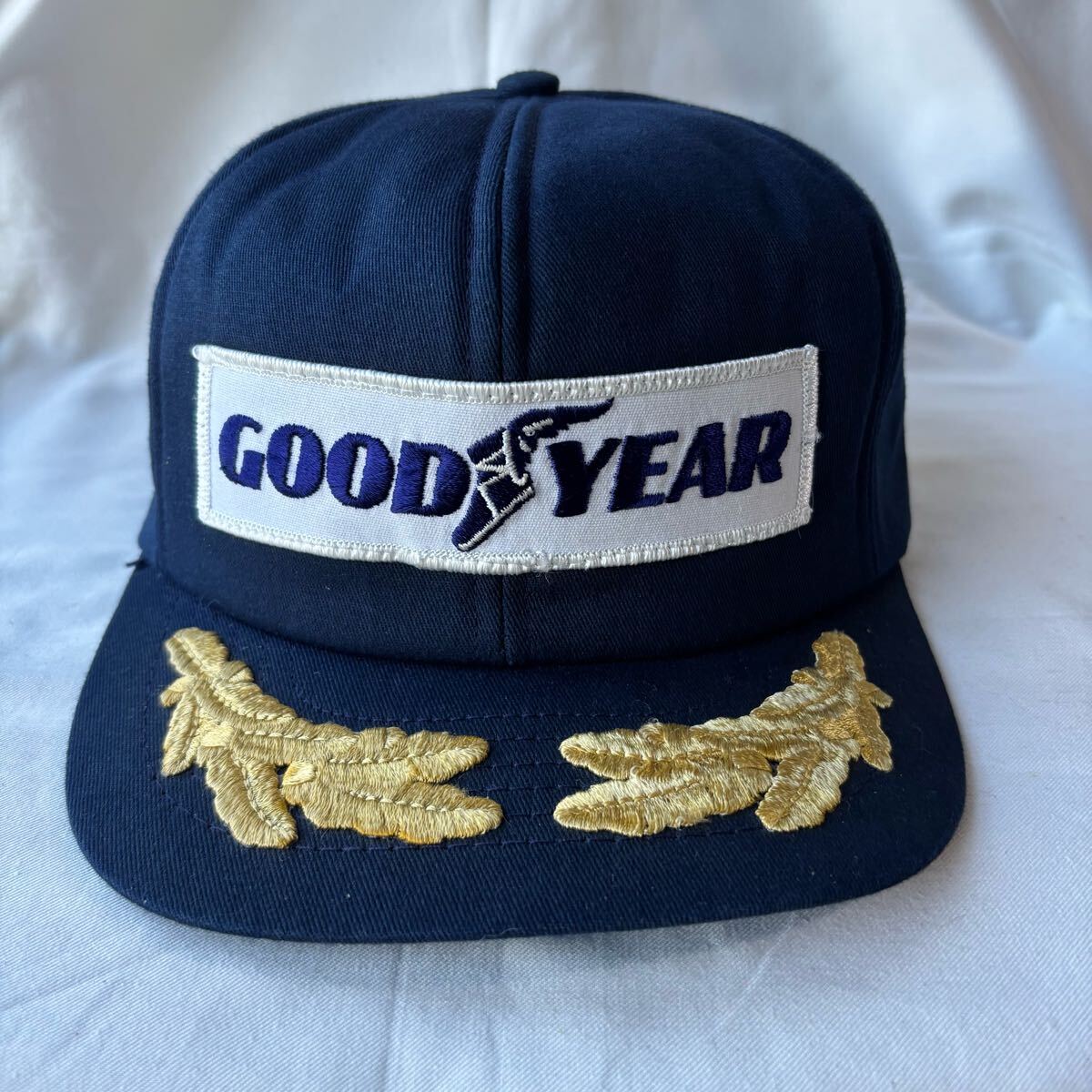 デッドストック GOOD YEAR キャップ Swingster 月桂樹 ビンテージ 帽子 グッドイヤー スウィングスター 識別帽 ゴールドリーフ 古着 リーフ拍卖