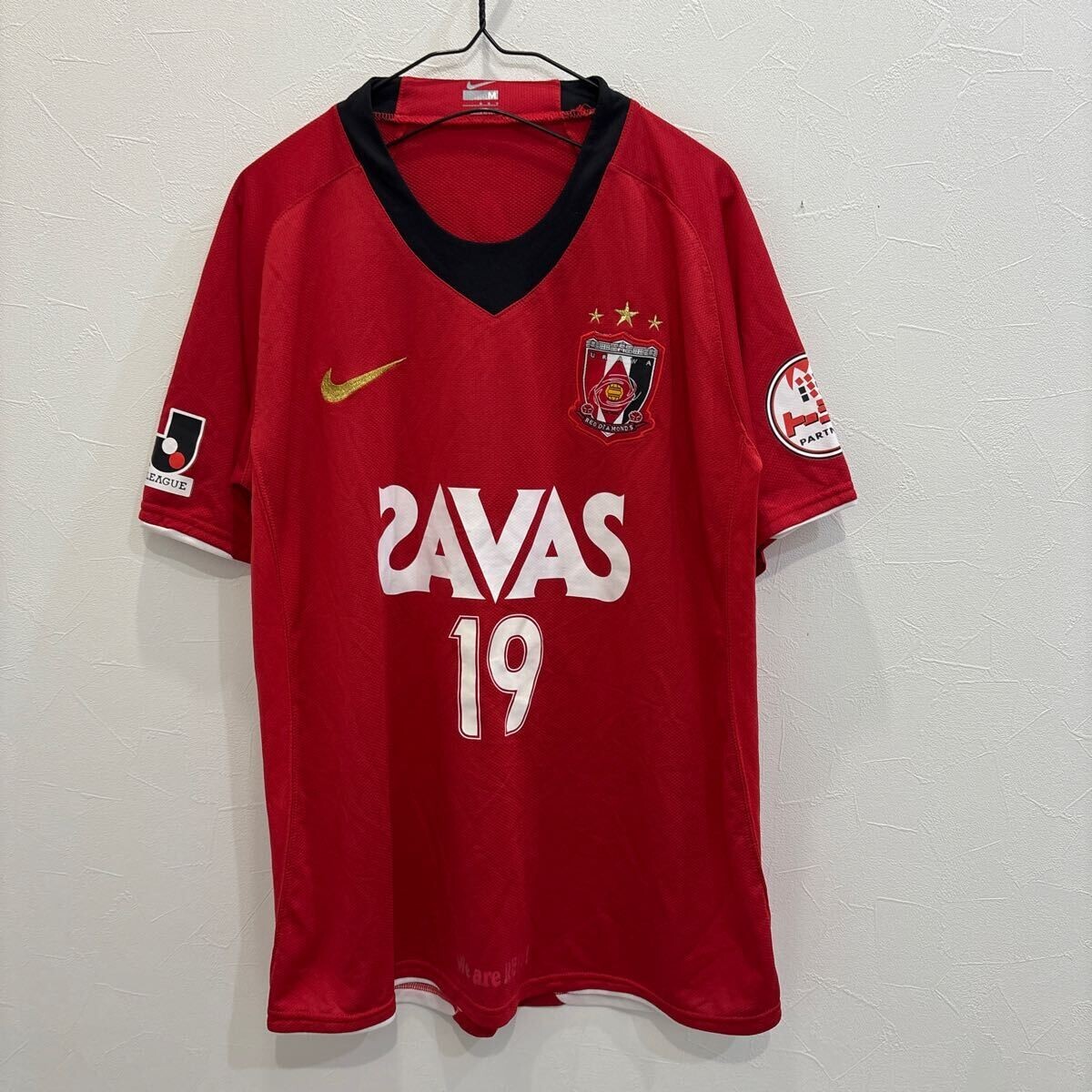 QY436 NIKE ナイキ 浦和レッズ ユニフォーム 半袖 ホーム #19 メンズM サッカー We are REDS!拍卖