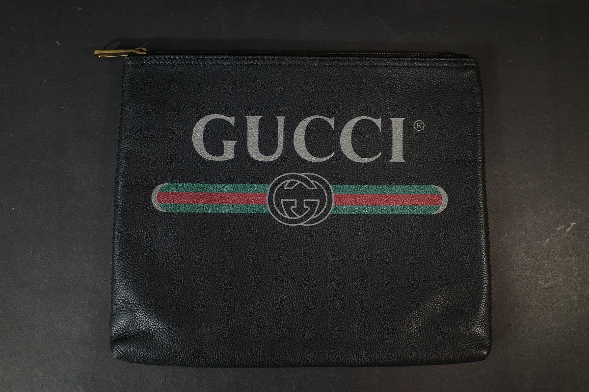 美品 GUCCI ポートフォリオ クラッチバッグ ロゴ プリント レザー ブラック 500981拍卖