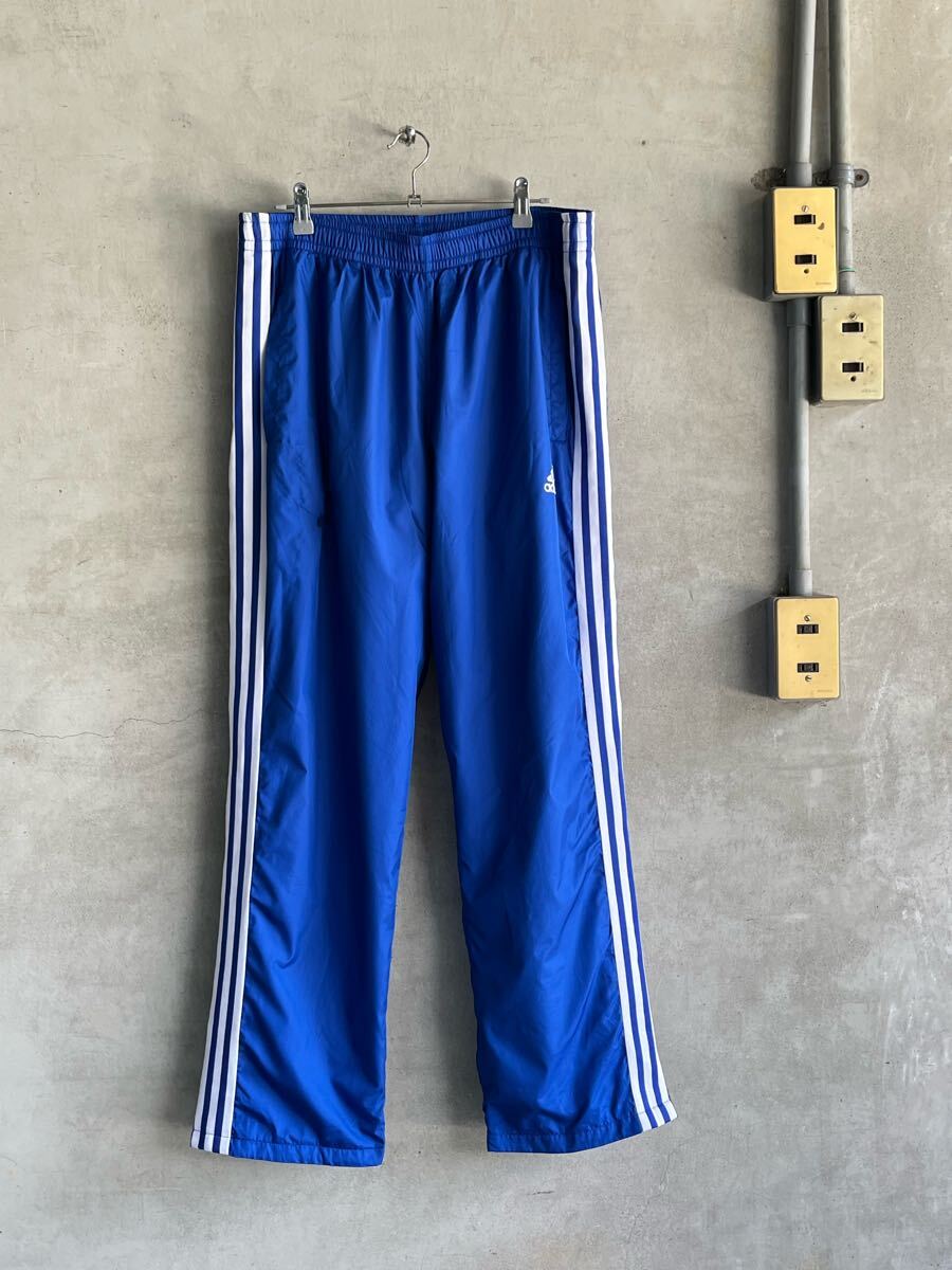90s 90年代 00s 2000年代 ビンテージ adidas アディダス トラックパンツ ジャージ ワンポイント ロゴ ブルー 青 3ライン ナイロン タグ 拍卖