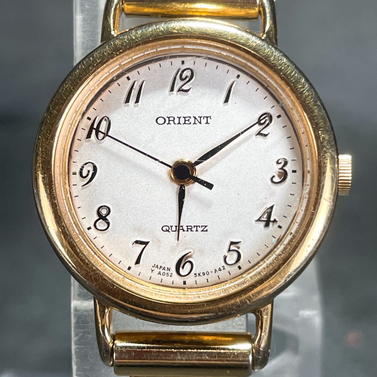 ORIENT オリエント A055K9-00 腕時計 アナログ クオーツ 3針 ホワイト文字盤 伸縮バンド ゴールド ラウンド ステンレススチール レディース拍卖
