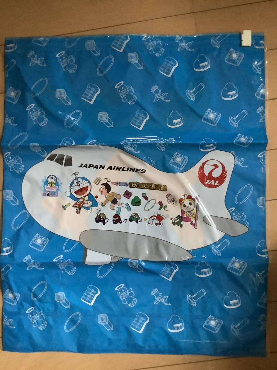 《値下げ》(12月下旬・出品終了予定)【日本航空 JAL】ドラえもんジェット トラベル圧縮袋(1枚)拍卖