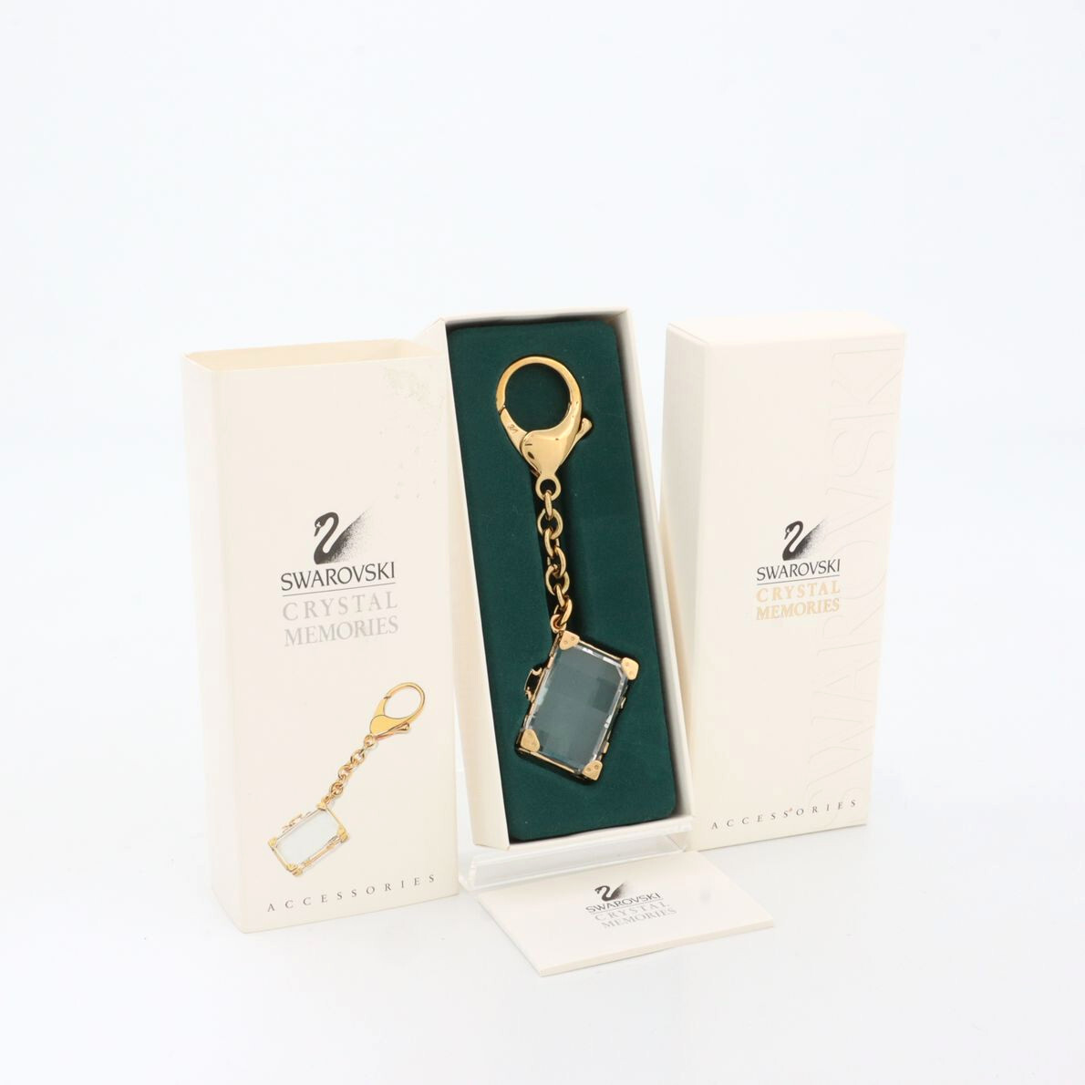 美品 スワロフスキー SWAROVSKI クリスタルメモリーズ キーホルダー キーリング チャーム トランク バッグ ゴールド金具 レディース拍卖