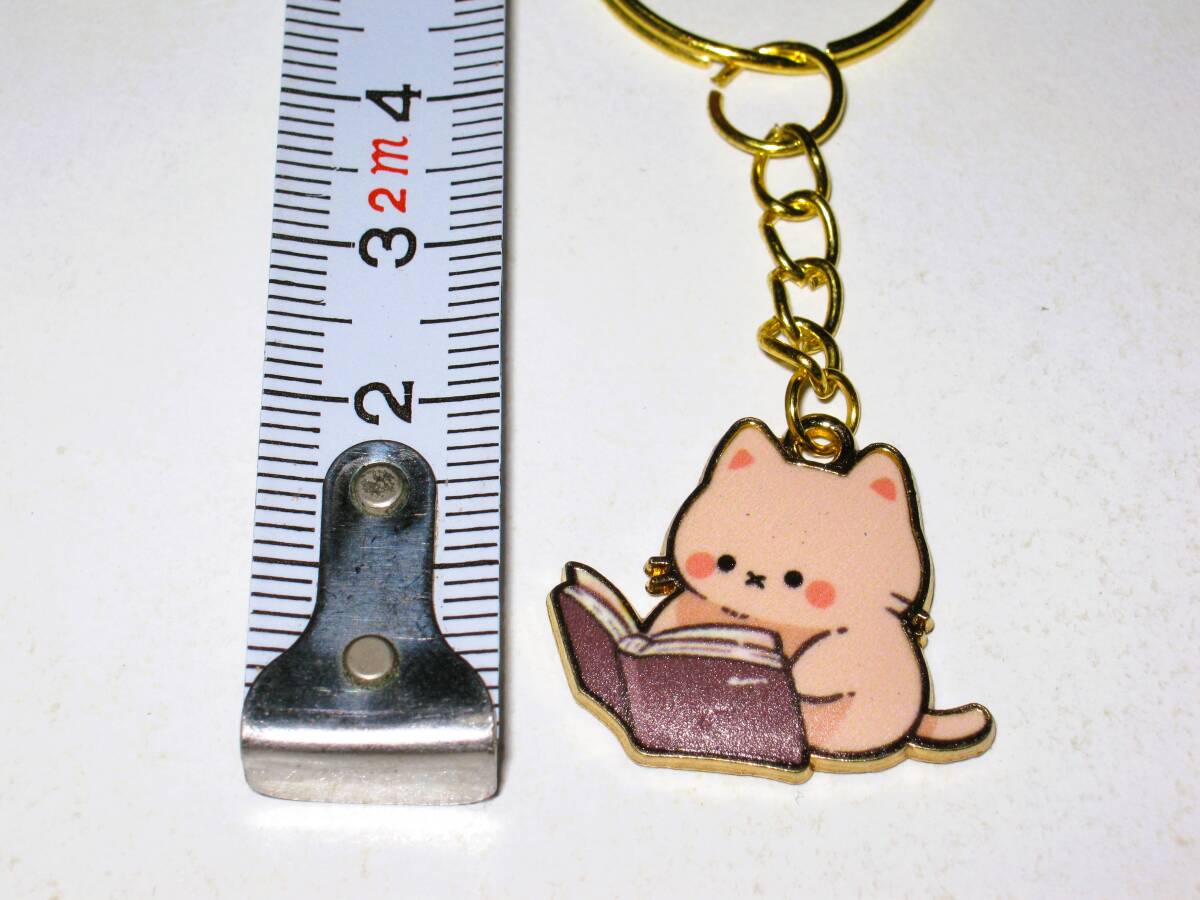 【ブック猫 キーリング】猫 ネコ アクセサリー バッグチャーム キーホルダー 本 お洒落 癒やし 癒し 可愛い 読書 レディース メンズ 小物拍卖