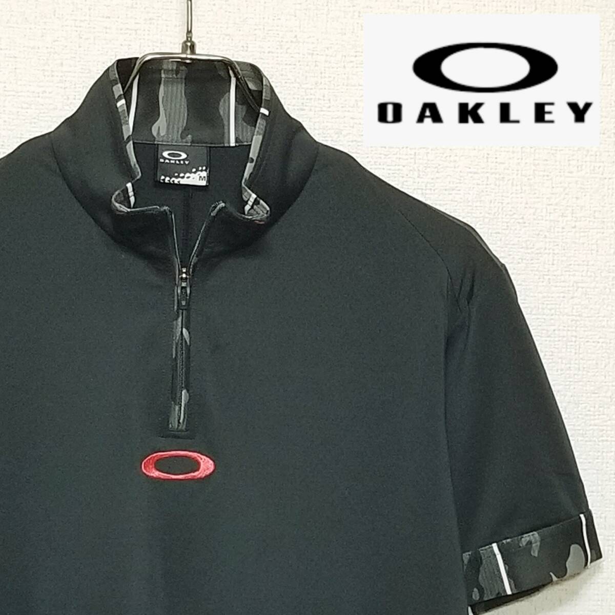 【美品】◎ OAKLEY オークリー/ 半袖 ワンポイント刺繍ロゴ&バックプリント文字ロゴ ハーフジップ ウェア SIZE: M ブラック拍卖