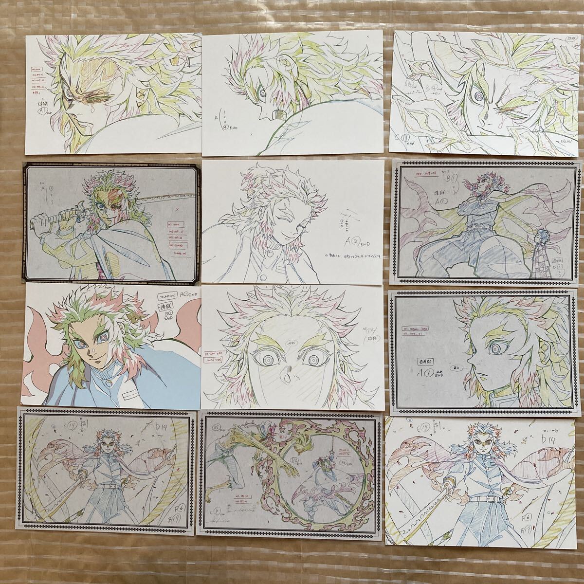 n5895 『鬼滅の刃』原画ポストカード 映画 無限列車編 煉獄杏寿郎 12枚セット 未使用拍卖