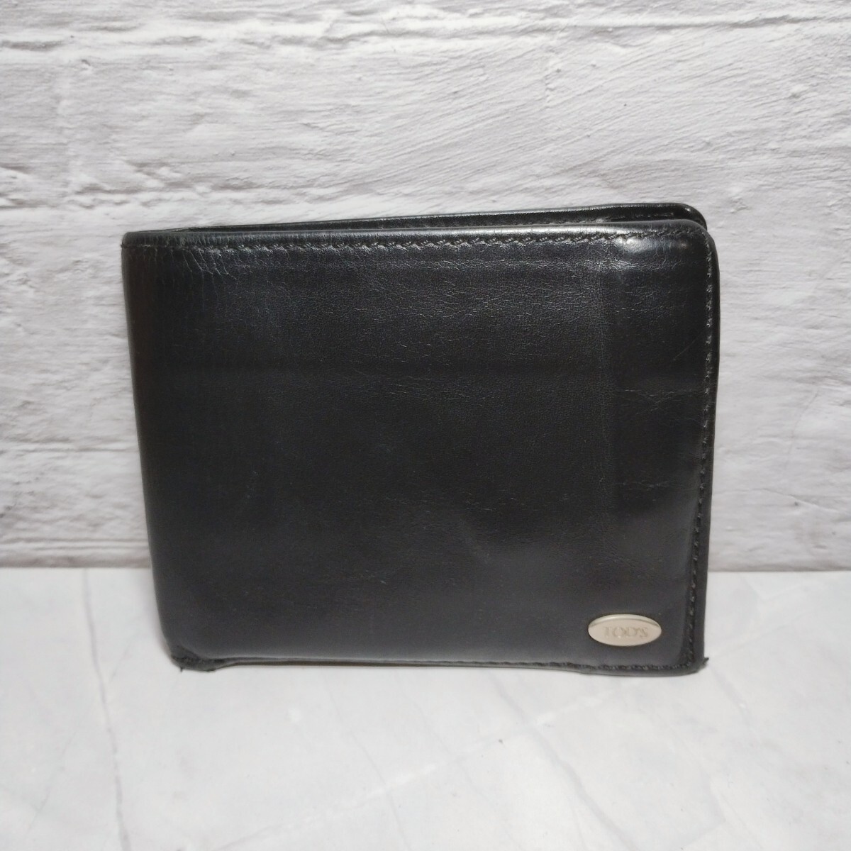TOD'S 二つ折り財布 レザー ブラック メンズ 小銭入れあり ウォレット トッズ 送料無料拍卖