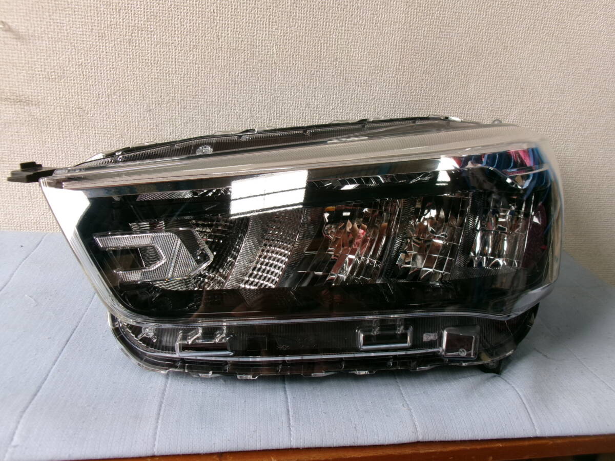 ⑦ ライズ ヘッドライト左 A200S ICHIKOH 1990 刻印 LE拍卖