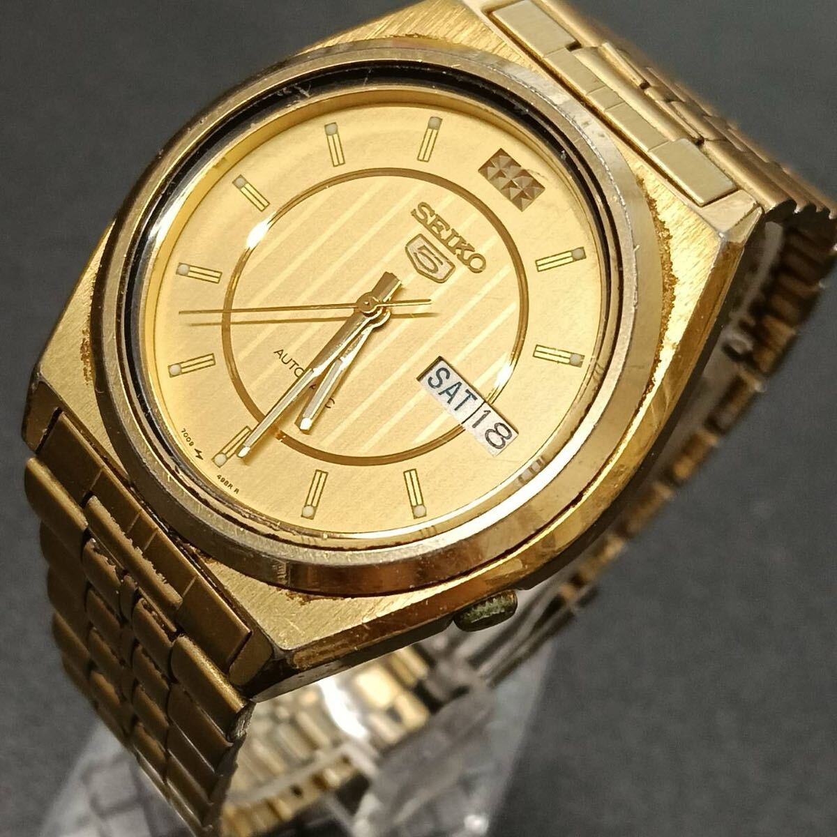 T278 【動作品】 SEIKO セイコー 5 腕時計 7000-876A オートマ 3針 金色文字盤 デイト アナログ ヴィンテージ アクセサリー ゴールド色拍卖