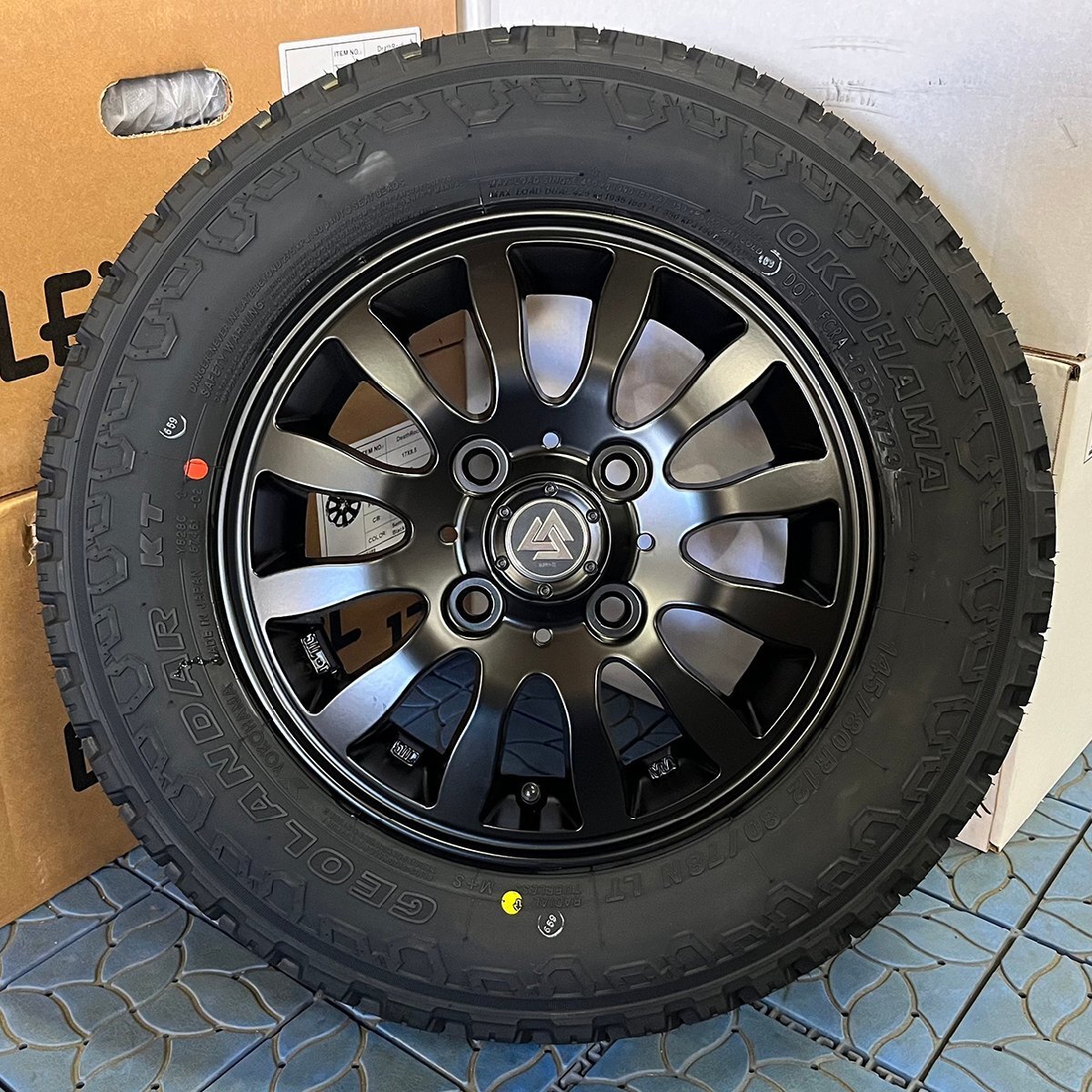 【新品4本】軽トラ 軽バン 車検対応 アクティ ハイゼット アトレー キャリィ 12インチ タイヤホイール YOKOHAMA ジオランダーKT 145/80R12拍卖