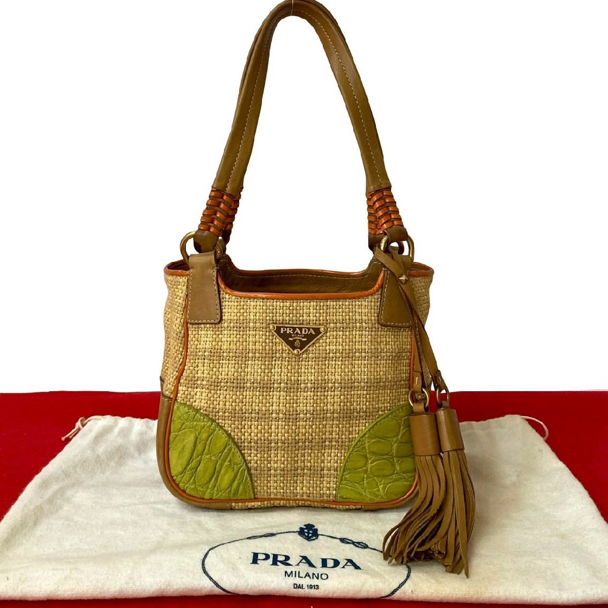 極 美品 袋付き PRADA プラダ 三角ロゴ 金具 ラフィア レザー 本革 スタッズ タッセル ハンドバッグ ミニ トートバッグ ベージュ 16711拍卖