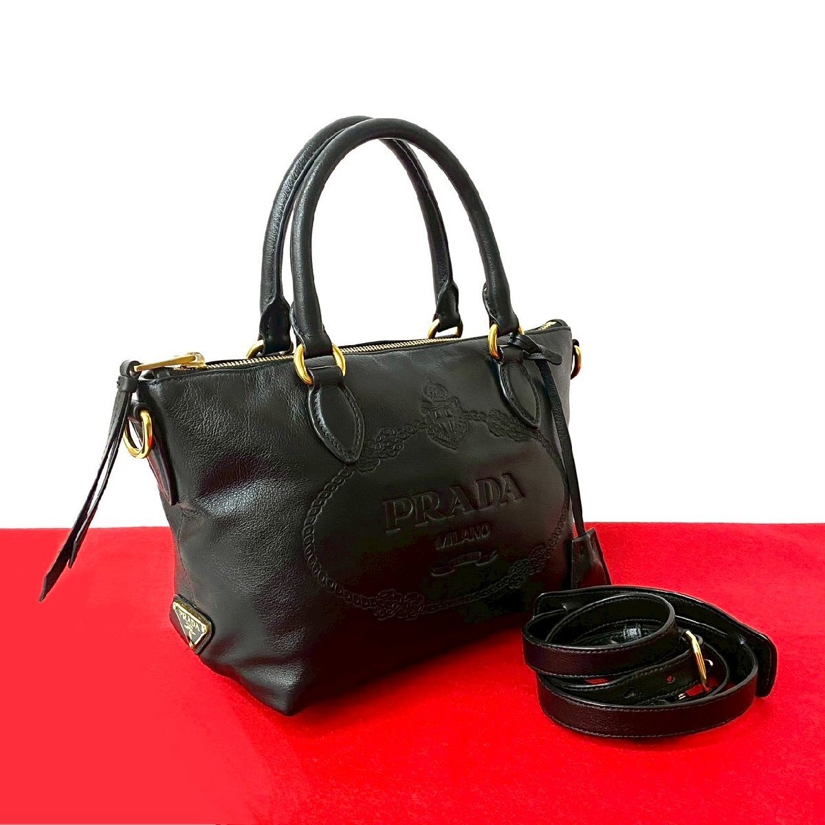極 美品 PRADA プラダ ロゴ 型押し カーフ レザー 本革 2way ハンドバッグ ミニ ボストンバッグ ショルダーバッグ ブラック 20031拍卖