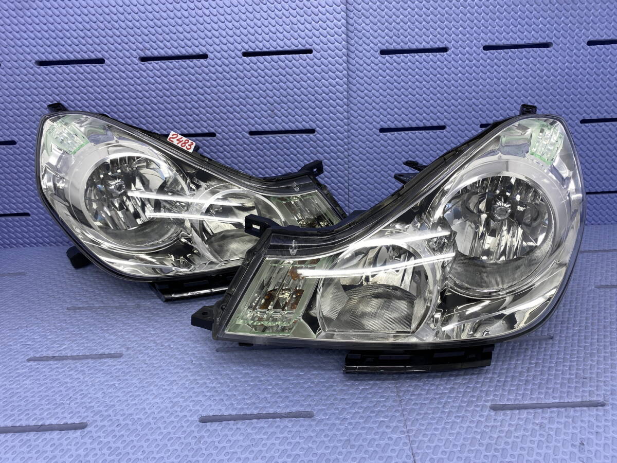 2483 * ウィングロード Y12 ヘッドライト 左右 イチコー 1777 ハロゲン レべ付拍卖