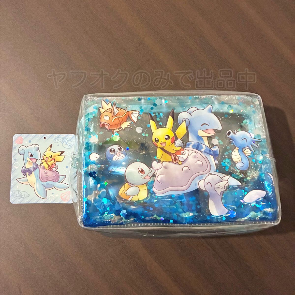 ポケモンセンター ラプラスに乗って ポーチ 2018年 ラプラス&ピカチュウ クリアポーチ ラメ 透明拍卖