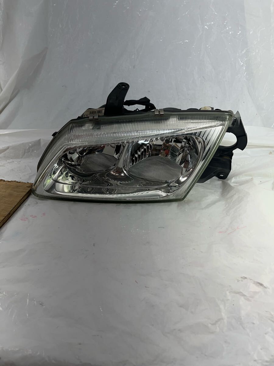 i7.10 ブルーバードシルフィ 左ヘッドライト 26060-BM811 左側助手席側 拍卖