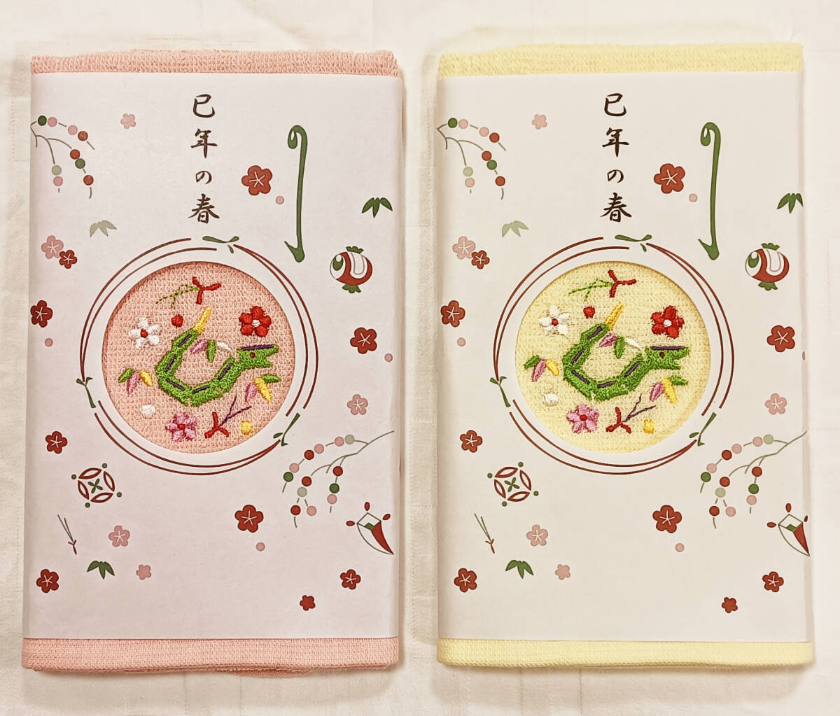 加藤萬・巳年の春 フェイスタオル 2枚セット ワンポイント刺繍 ピンク・イエロー 黄色 2本セット 干支タオル拍卖