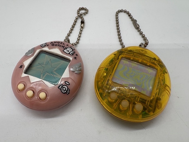 K7237A◆ バンダイ たまごっち 2種セット てんしっちのたまごっち 新種発見!!たまごっち クリアーイエロー 電子ゲーム レトロ 当時品拍卖