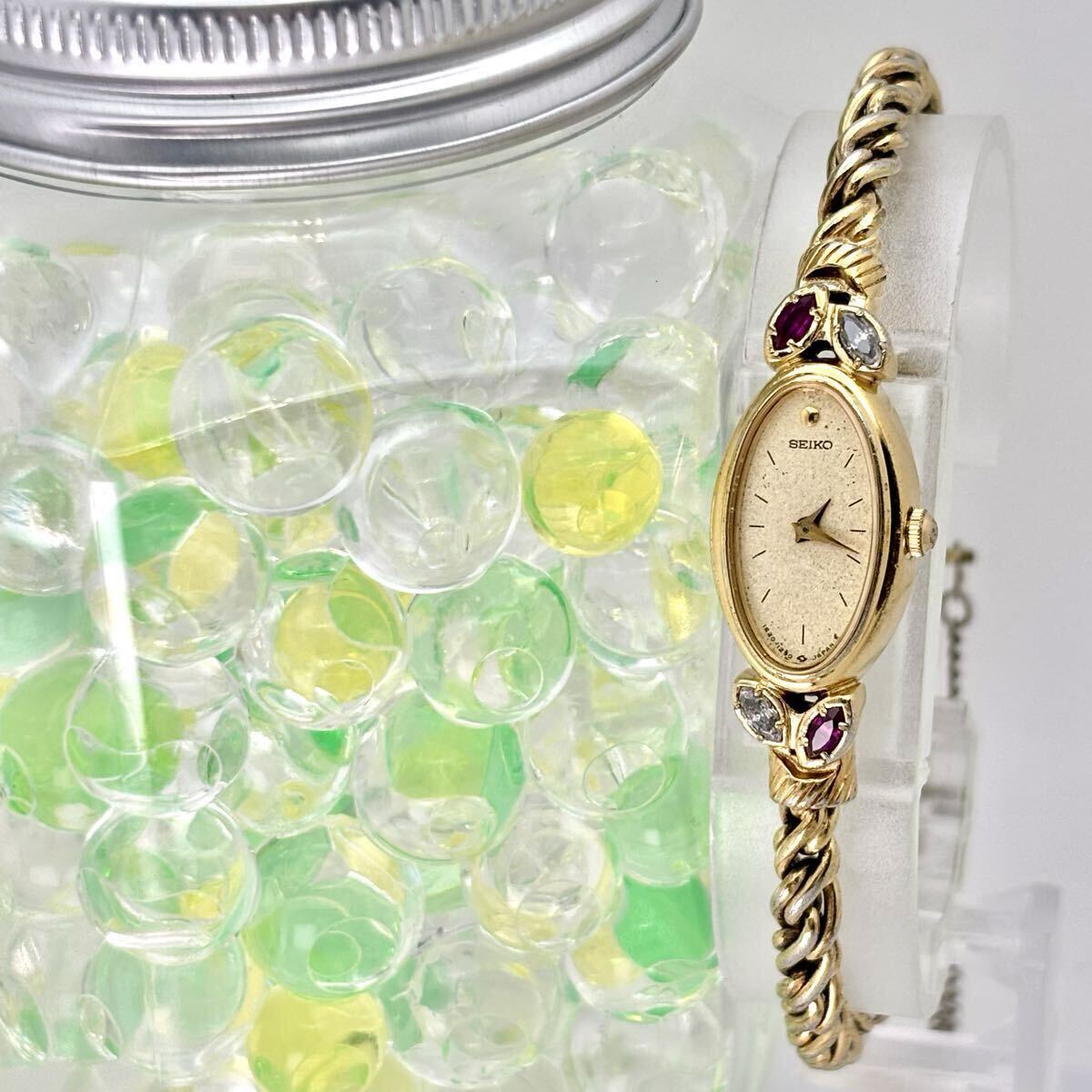 【新品電池】 SEIKO セイコー 4Pカラーストーン レディース 腕時計 ゴールド ドレス オーバル 1E20-5760 705129拍卖