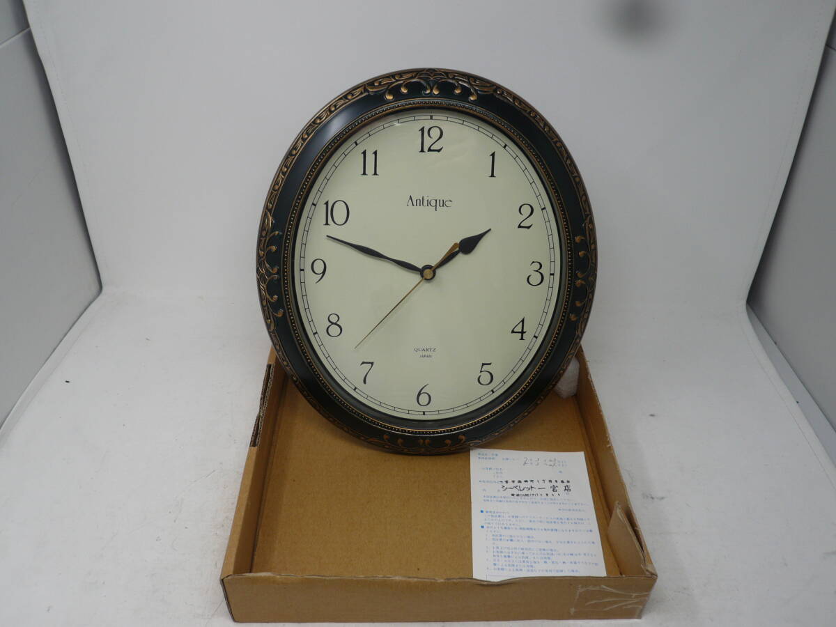 中古 鹿野漆器株式会社 レリーフ小判時計 クオーツ 時計 【V-300】送料無料(北海道沖縄離島佐川急便中継料金がかかる地域は除く)拍卖