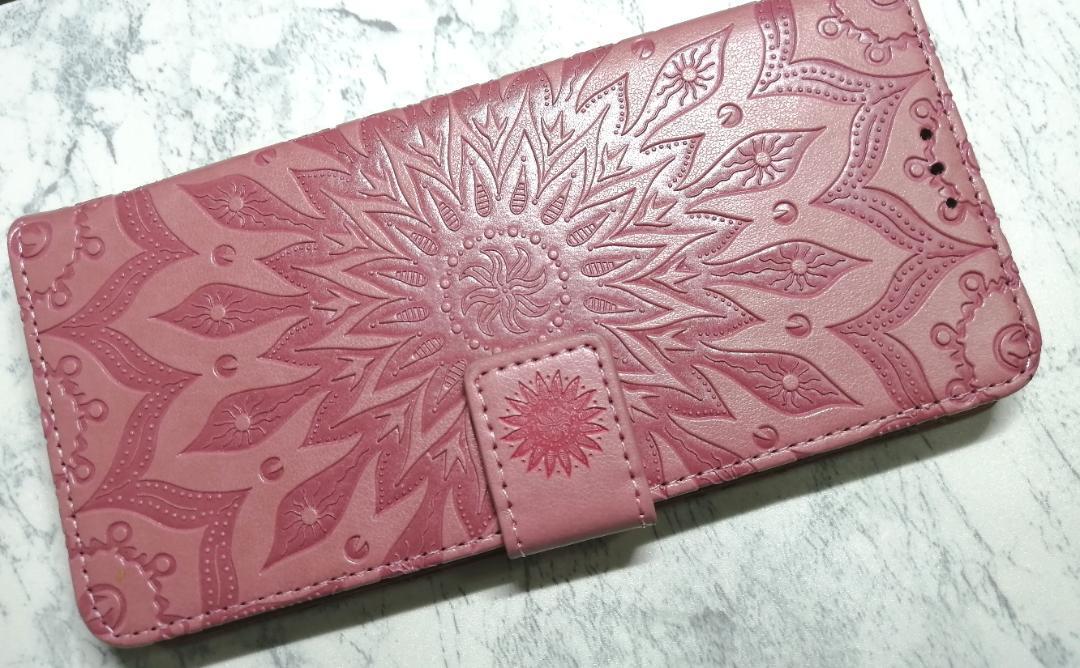 手帳型 iphone14promax 用 ケース 浮彫エスニック柄 ピンク拍卖