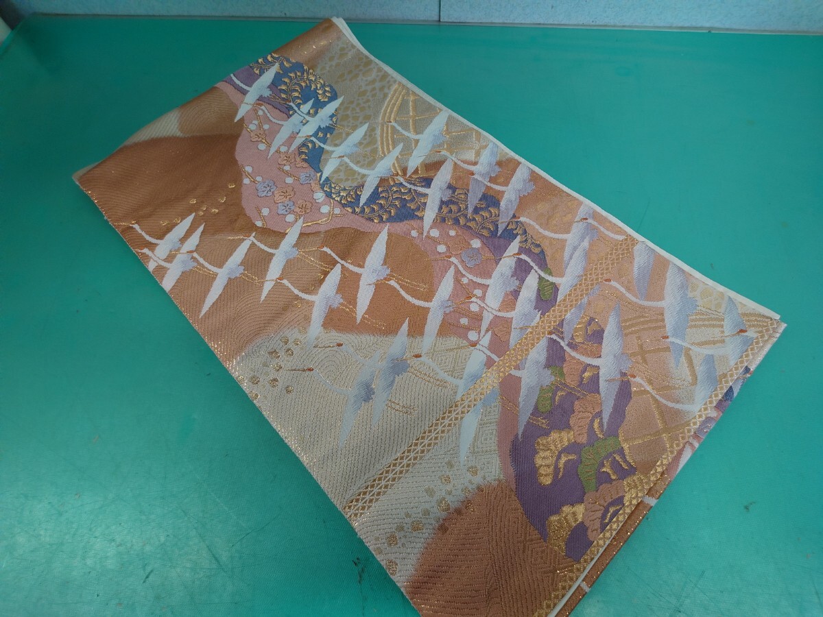 ●111【本金箔24K】【琳派百景】正絹 金糸 金彩 鶴 丹頂 松 梅 くすみ ピンク 紫 青 豪華 高級 六通 袋帯 縁起物 中古 ③拍卖