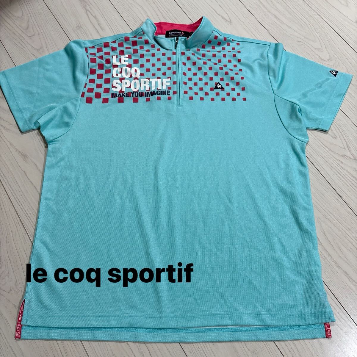 le coq sportif ルコックスポルティフ ハーフジップ ゴルフウェア 半袖 水色 サイズ:LL THF-218拍卖