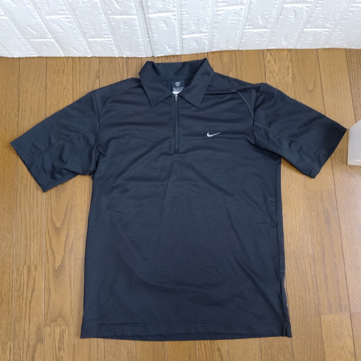 2172【中古】NIKE GOLF ナイキゴルフ ゴルフウェア 半袖ハーフジップシャツ メンズサイズ M 黒拍卖