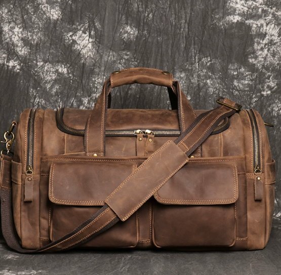 新款男士真皮手提包手工牛皮旅行包皮大容量手提袋拍卖